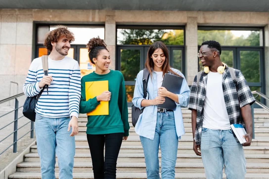 Students walking together outside a university building